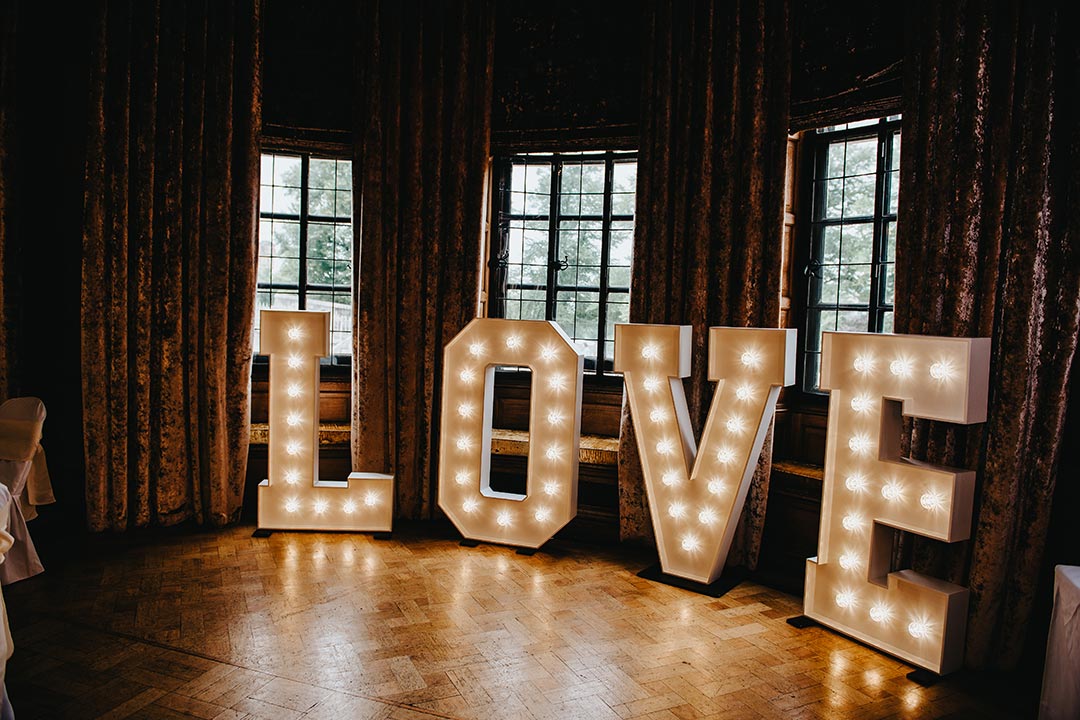 Vintage word LOVE written in giant light up letters
