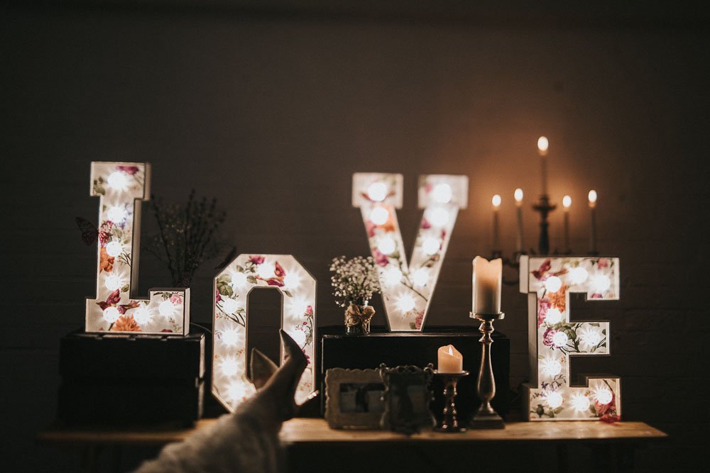 Bride relaxing with small light up letters of LOVE from Ray of Light letters, Lincolnshire and Yorkshire